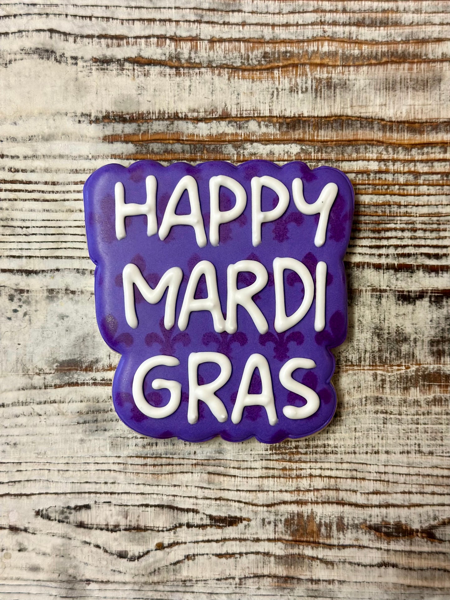 Cortador de galletas con placa de Mardi Gras